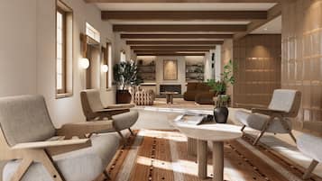 A modern interior with a central seating area, wooden accents, and a patterned floor.