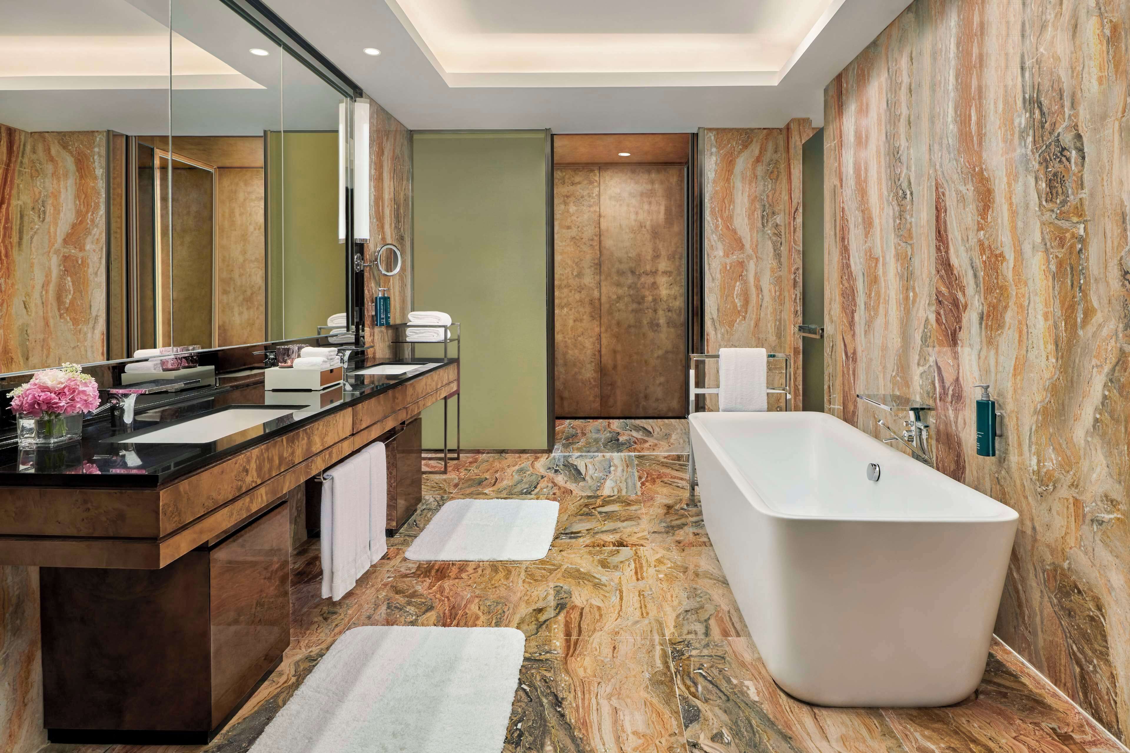 panorama junior suite | bathroom | separate bathtub and shower, rainfall showerhead, free toiletries