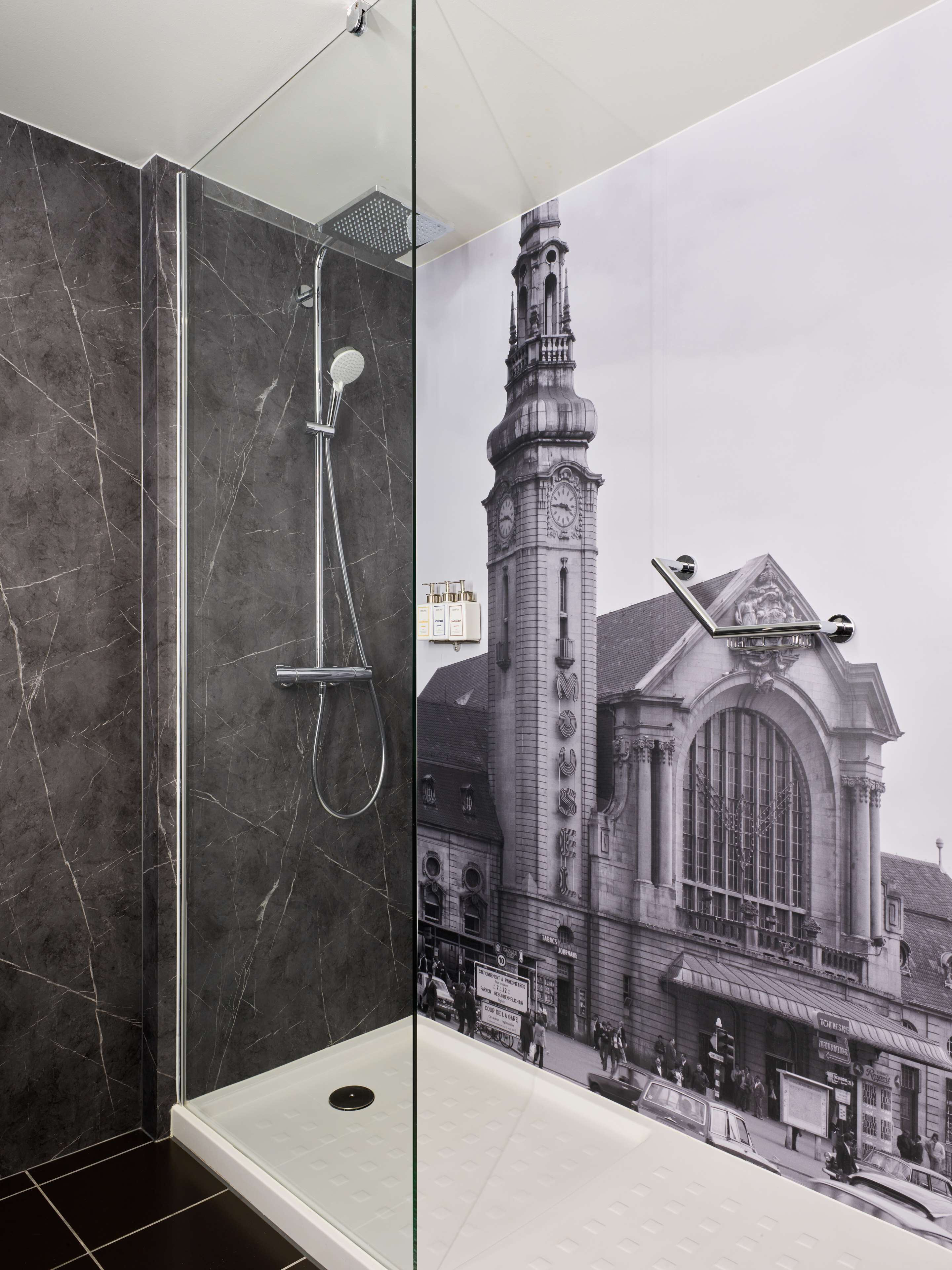 superior room | bathroom | shower, hair dryer, towels