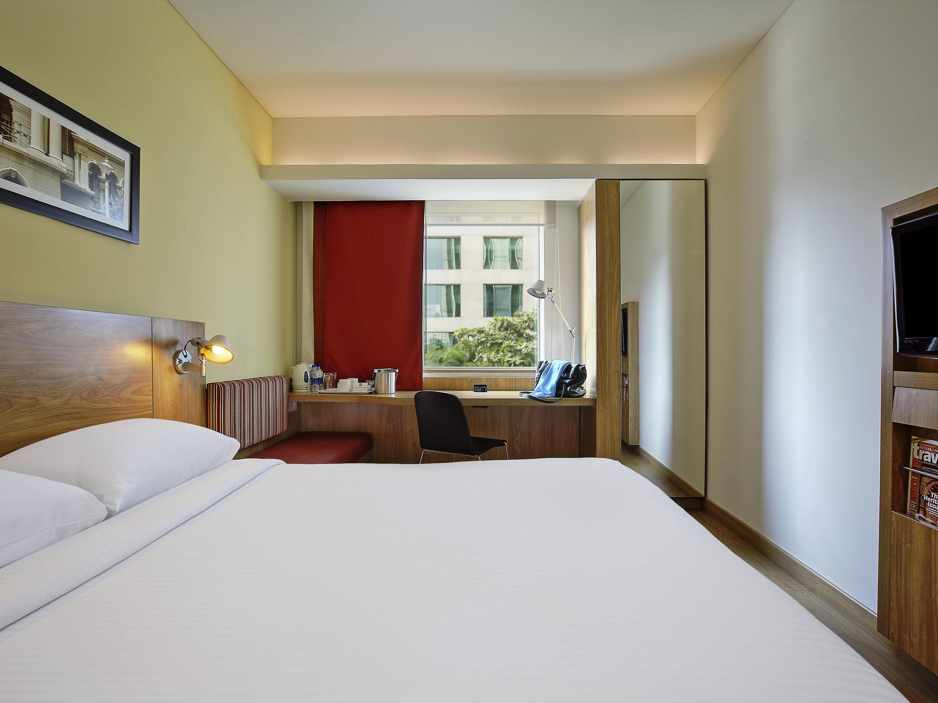 Sengetøy av topp kvalitet, minibar, safe på rommet og skrivebord