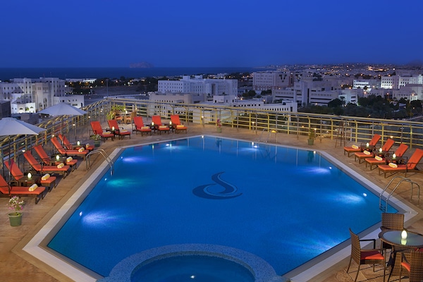 Outdoor pool, open 8:00 AM to 8:00 PM, pool umbrellas, sun loungers