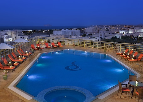 Outdoor pool, open 8:00 AM to 8:00 PM, pool umbrellas, pool loungers. City Seasons Hotel Muscat