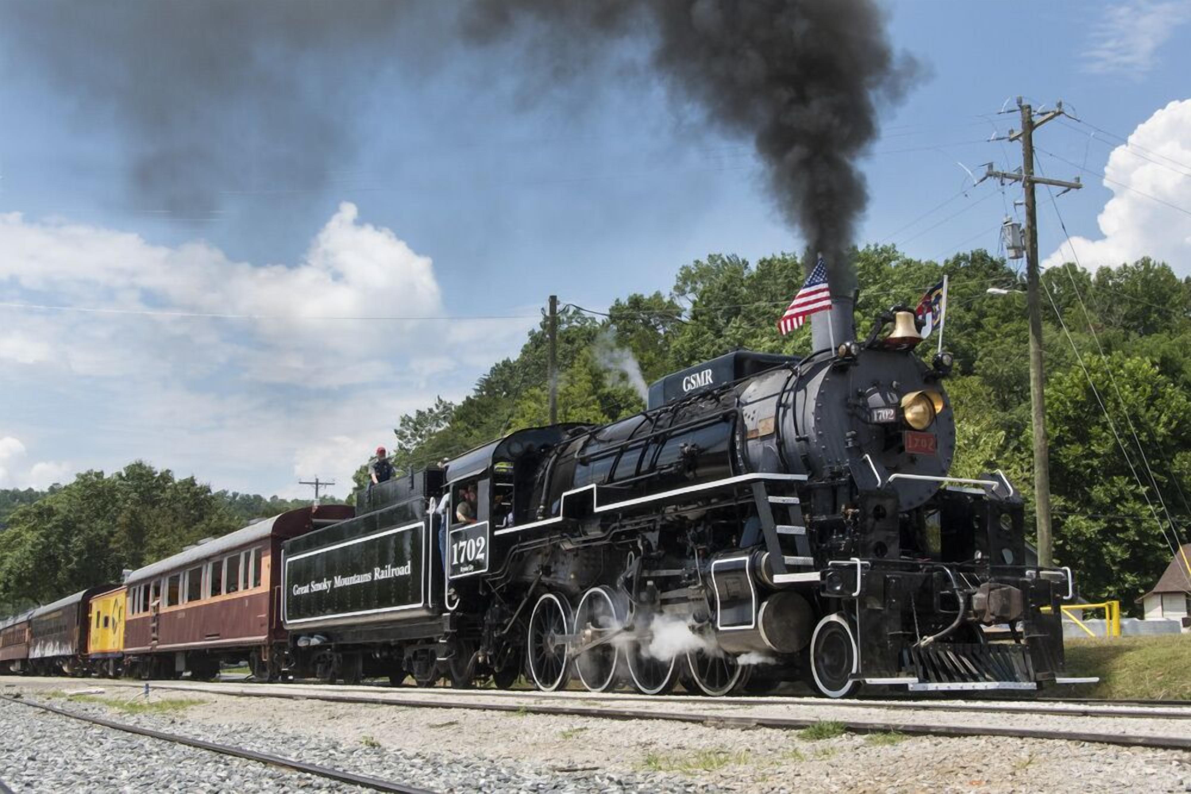 A steam locomotive with the number 1702 on the Great Smoky Mountains Railroad.