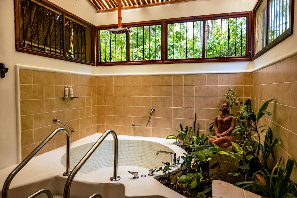 exclusive villa | bathroom | shower, rainfall showerhead, hair dryer, towels