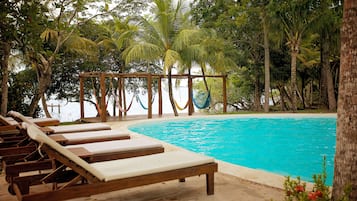 Outdoor pool, open 8:00 AM to 10:00 PM, sun loungers