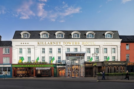 The Killarney Towers Hotel with a classic facade, multiple windows, and a prominent entrance.. Killarney Towers Hotel & Leisure Centre