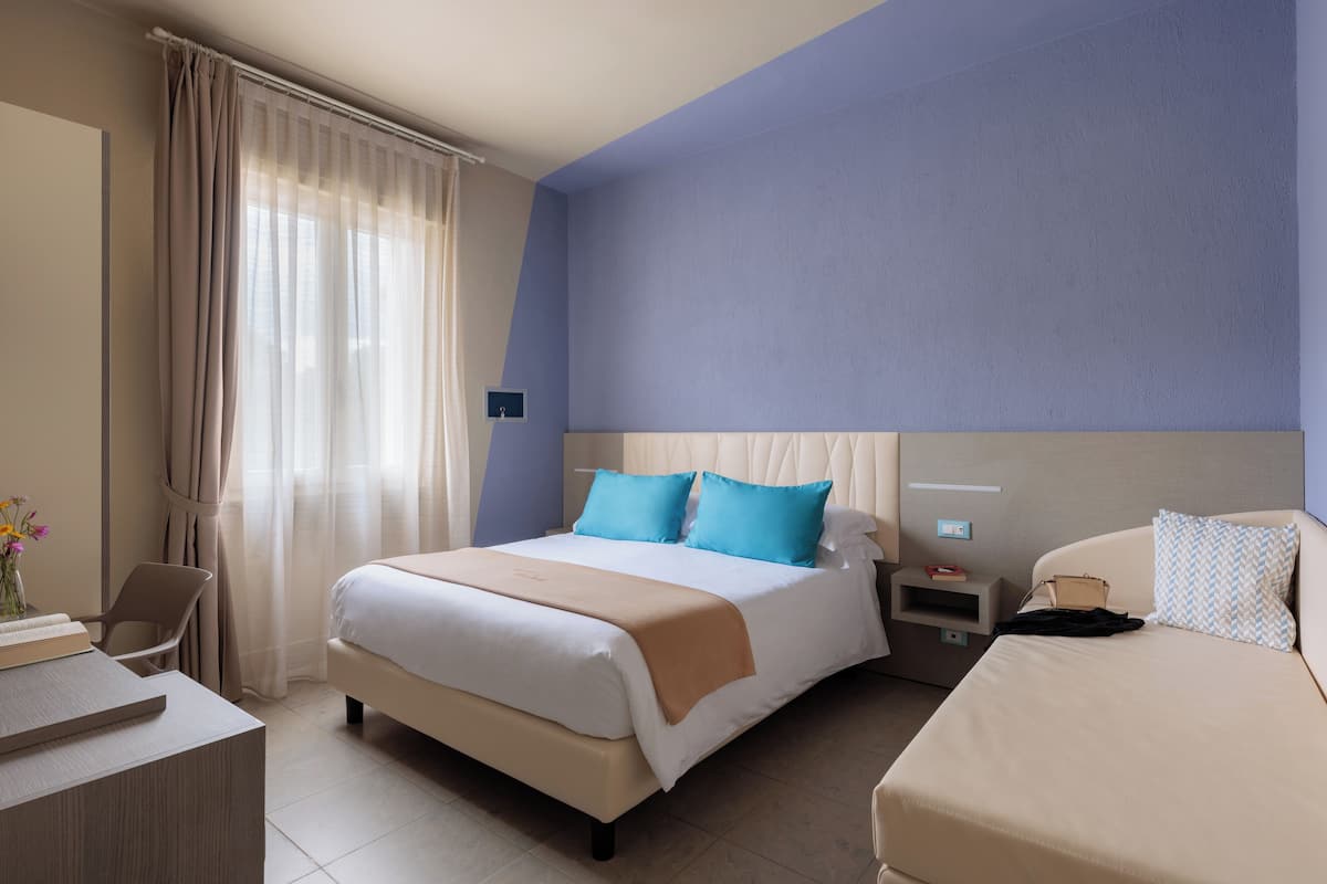 Frette Italian sheets, Select Comfort beds, minibar, in-room safe