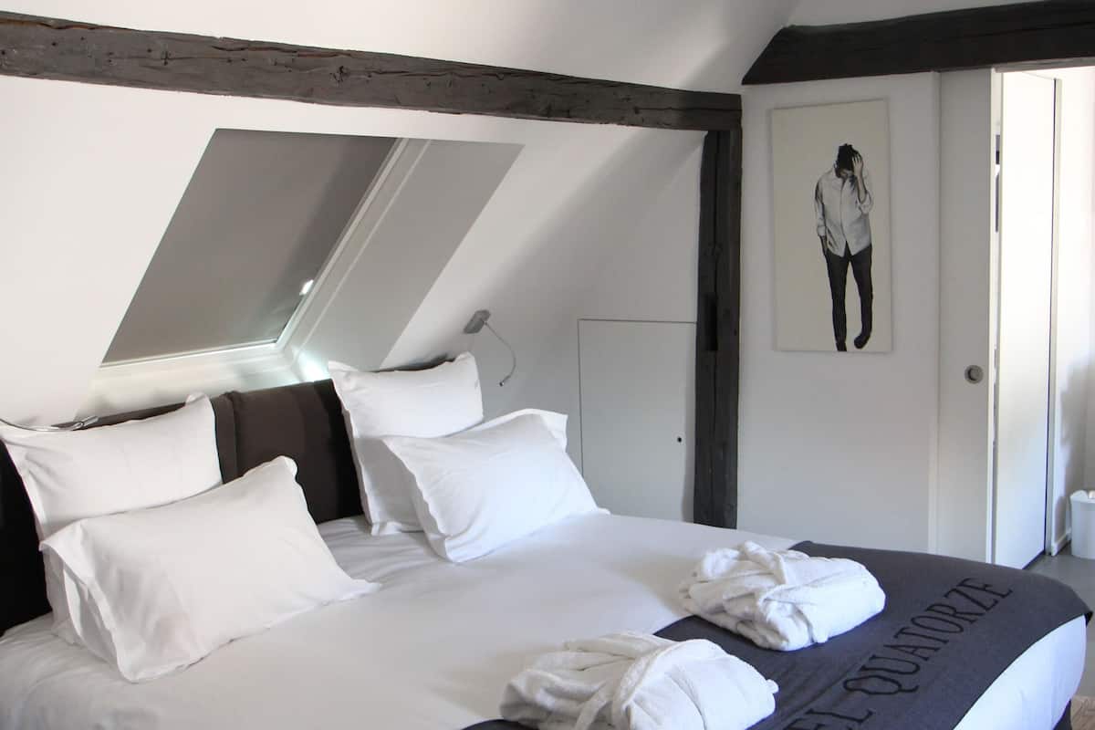 Biancheria da letto di alta qualità, minibar, insonorizzazione