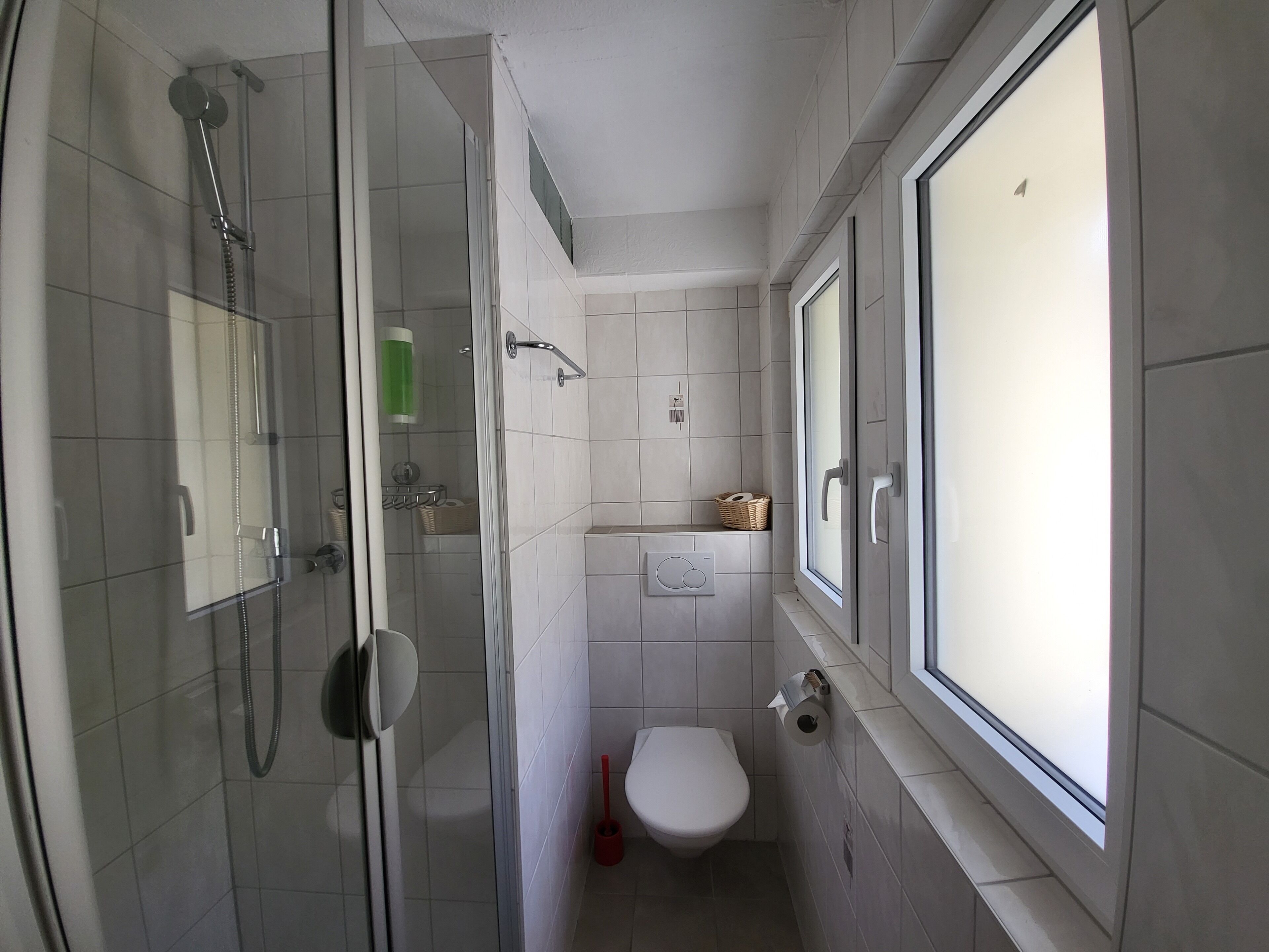 superior single room, balcony | bathroom | shower, hair dryer, towels