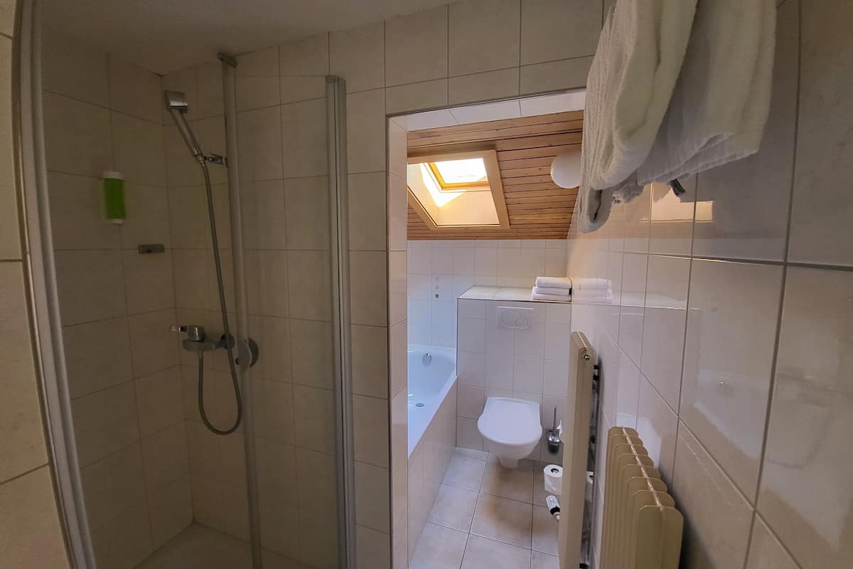 family room | bathroom | shower, hair dryer, towels