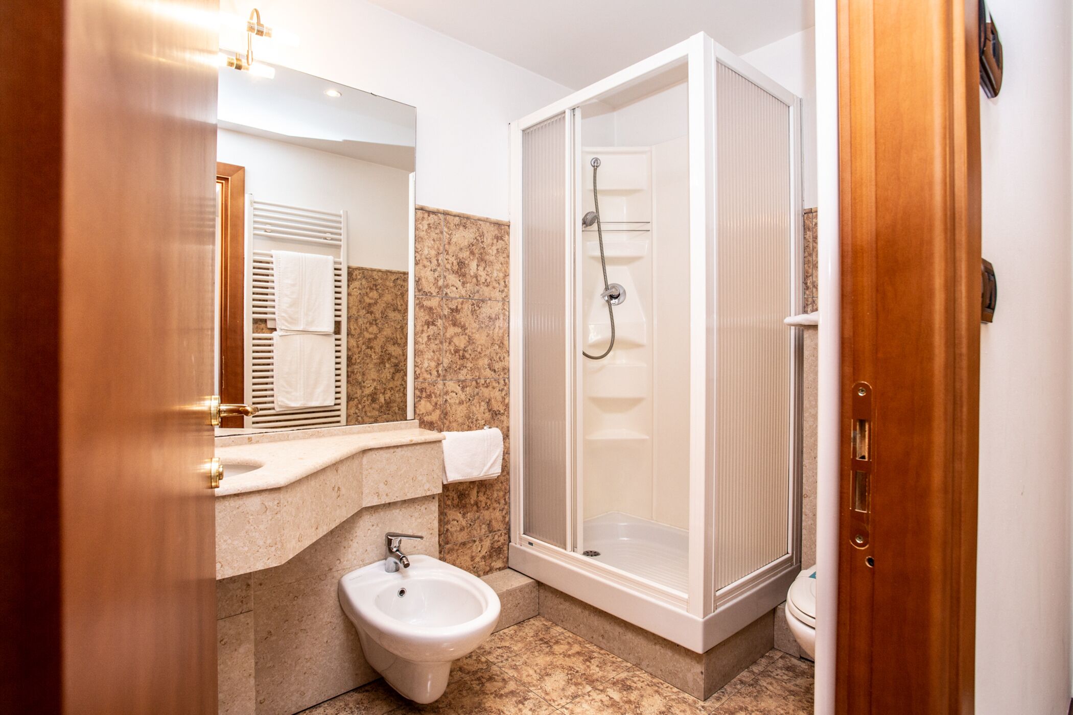 free toiletries, hair dryer, bidet, towels