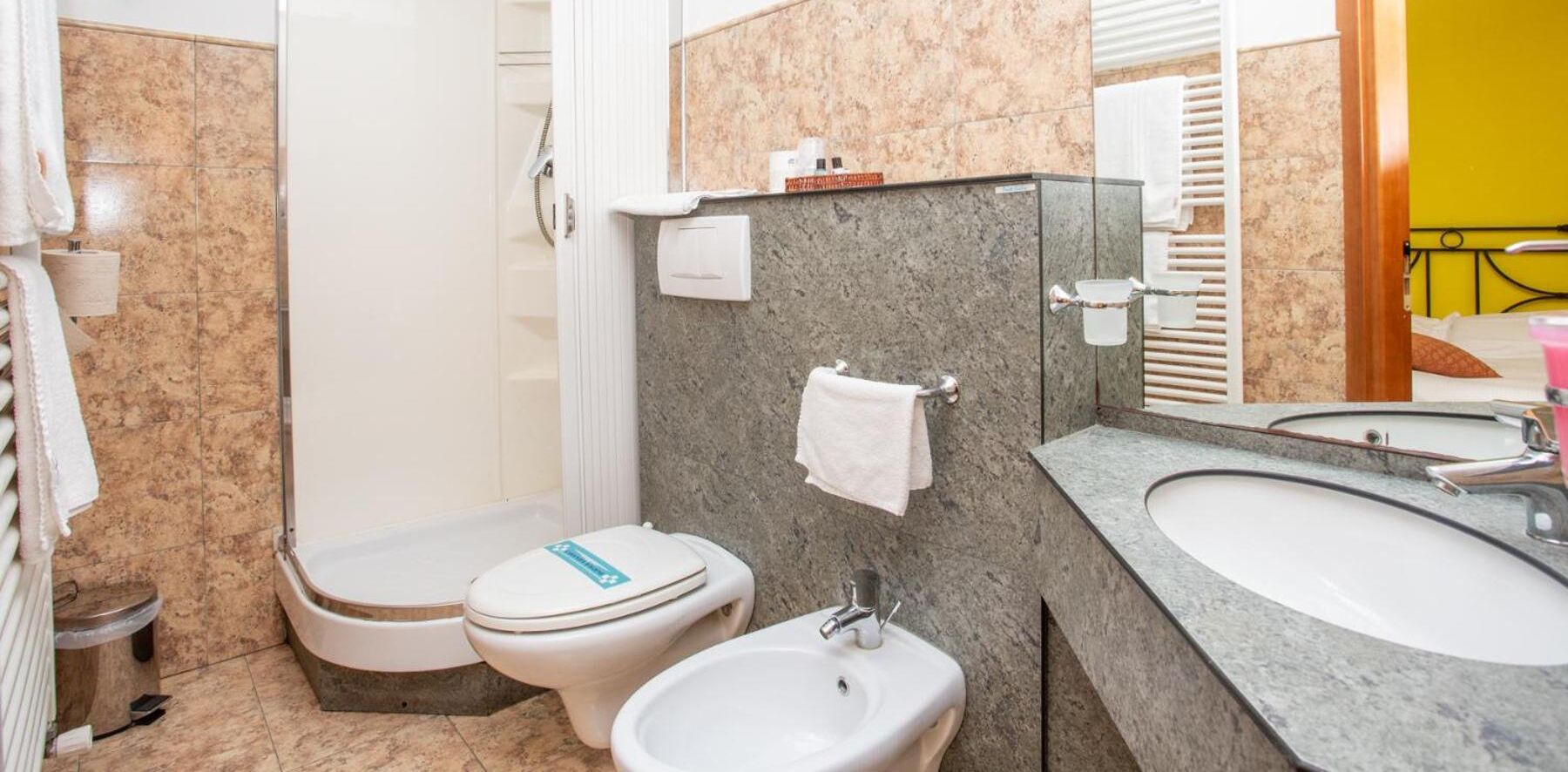 free toiletries, hair dryer, bidet, towels