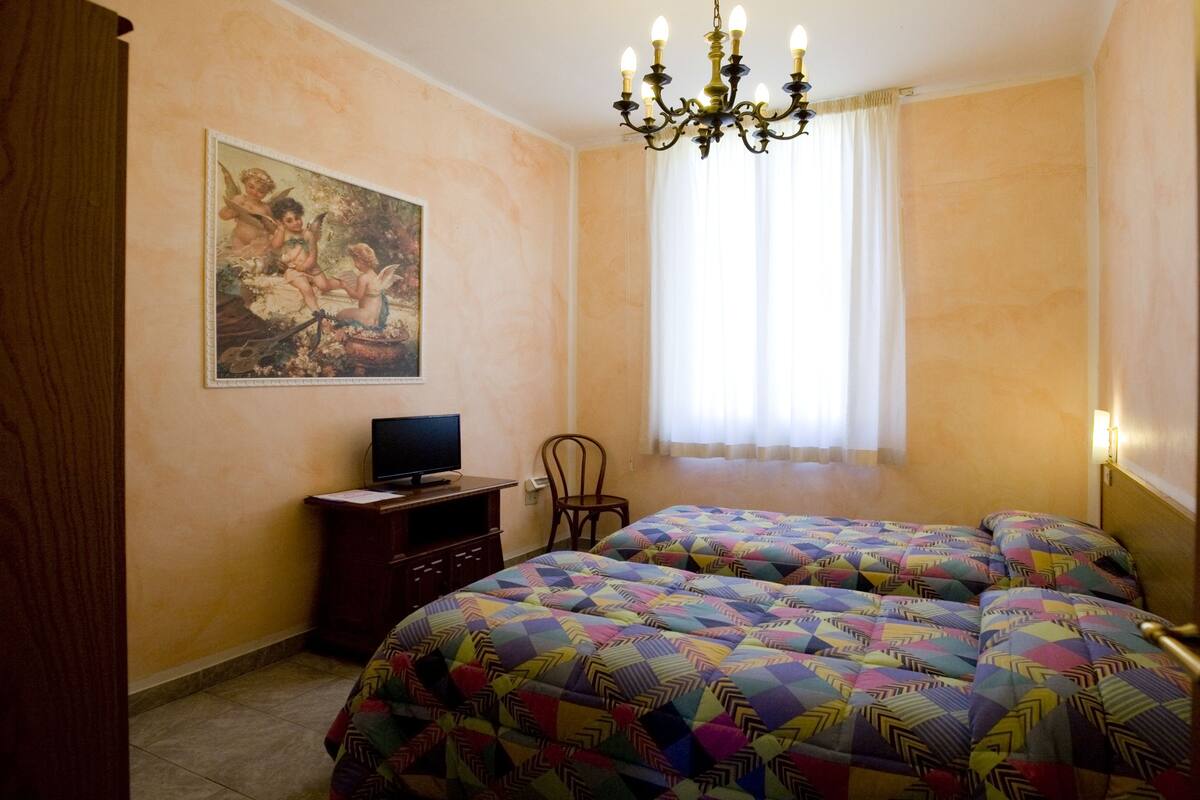 Down comforters, desk, WiFi (free)
