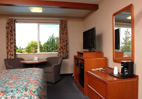 Tabla de planchar con plancha, wifi gratis y ropa de cama 