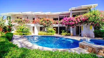 2 outdoor pools, open 9:00 AM to 8:00 PM, pool loungers