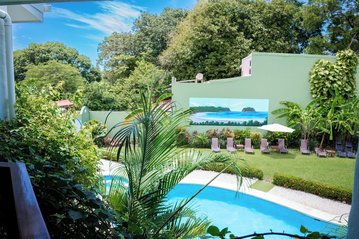 Double Room, Pool View | In-room safe, desk, free WiFi, bed sheets