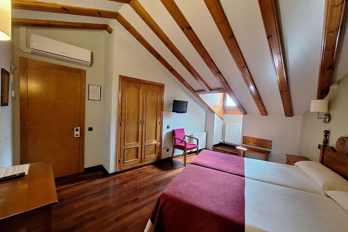 Double Room 2 beds attic exterior | Premium bedding, desk, laptop workspace, blackout drapes