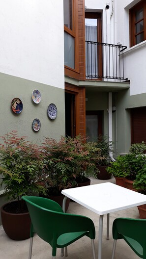 Chambre quadruple | Terrasse/patio