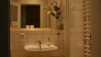 Standard Apartment | Bathroom | Hair dryer, towels