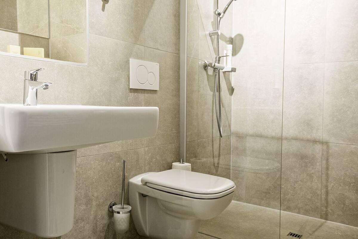 shower, eco-friendly toiletries, hair dryer, towels