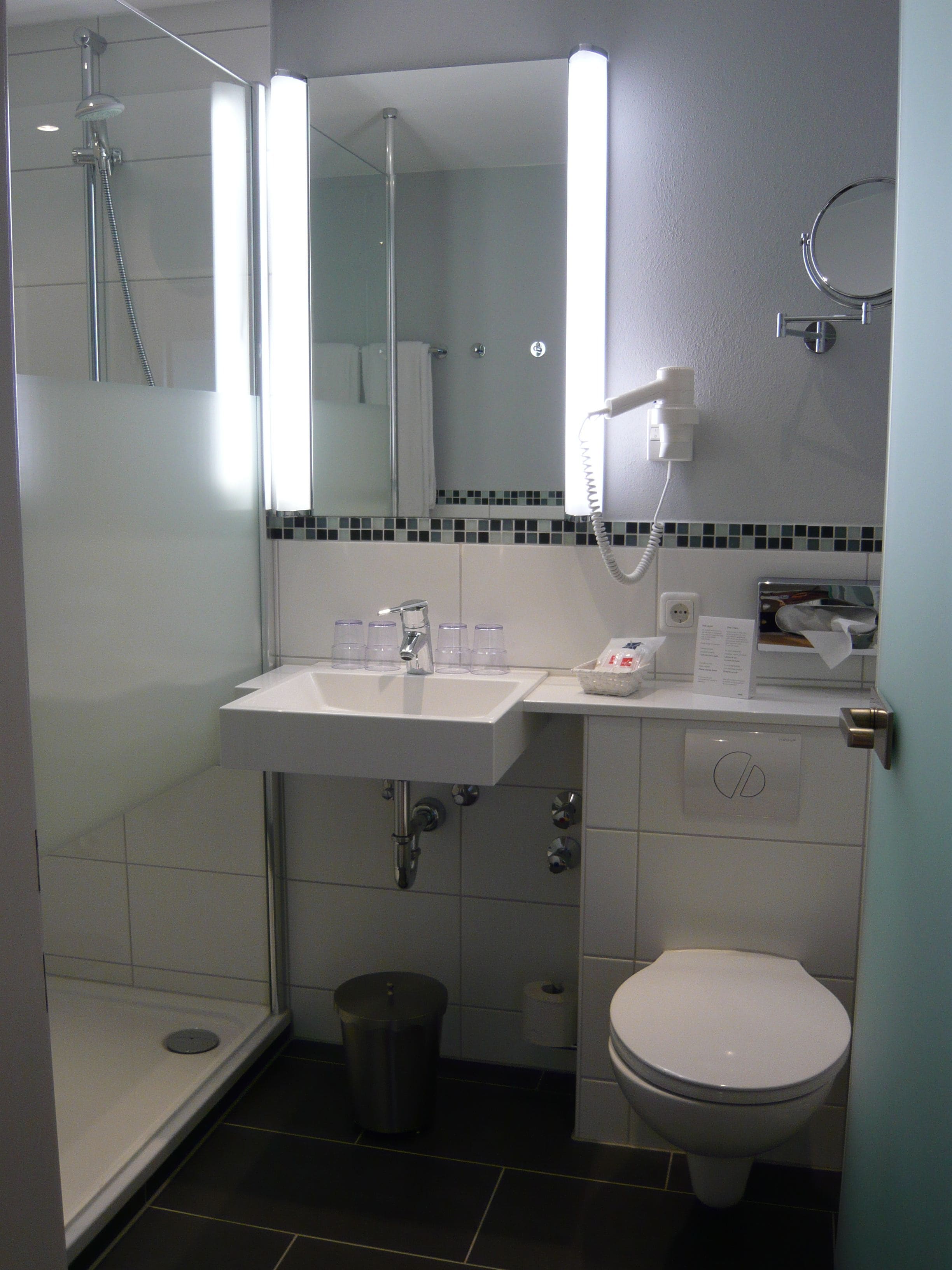 shower, eco-friendly toiletries, hair dryer, towels