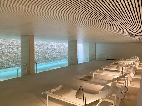 Indoor pool, sun loungers. Square Nine Hotel Belgrade-The Leading Hotels of The World
