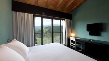 1 dormitori, roba de llit d'alta qualitat, minibar i escriptori