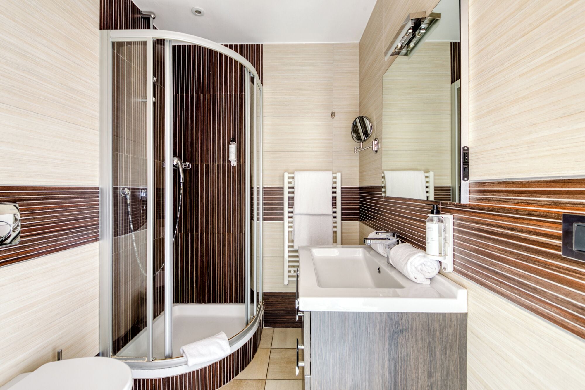 superior room | bathroom | shower, hair dryer, towels