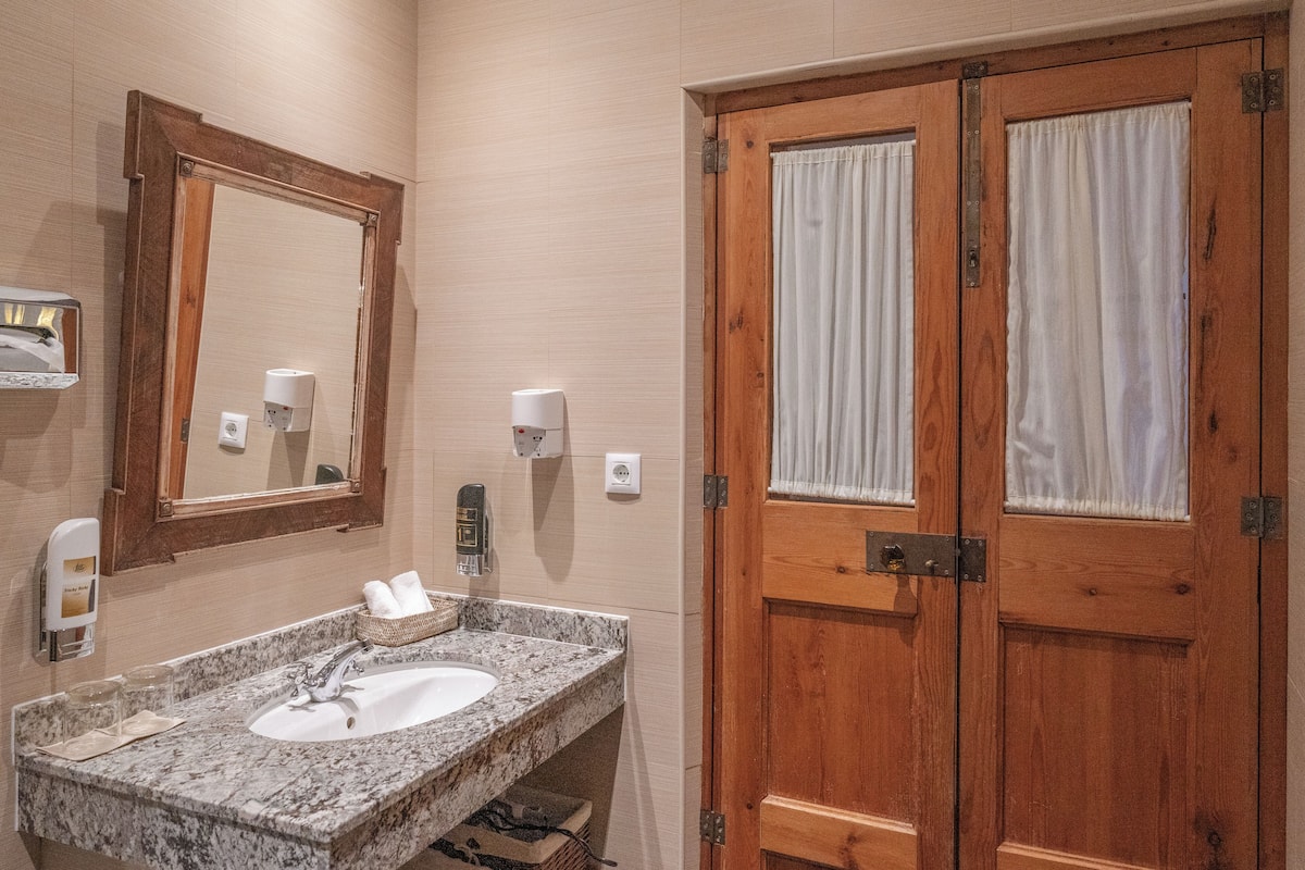 suite (4 person) | bathroom | deep-soaking bathtub, designer toiletries, hair dryer, bathrobes