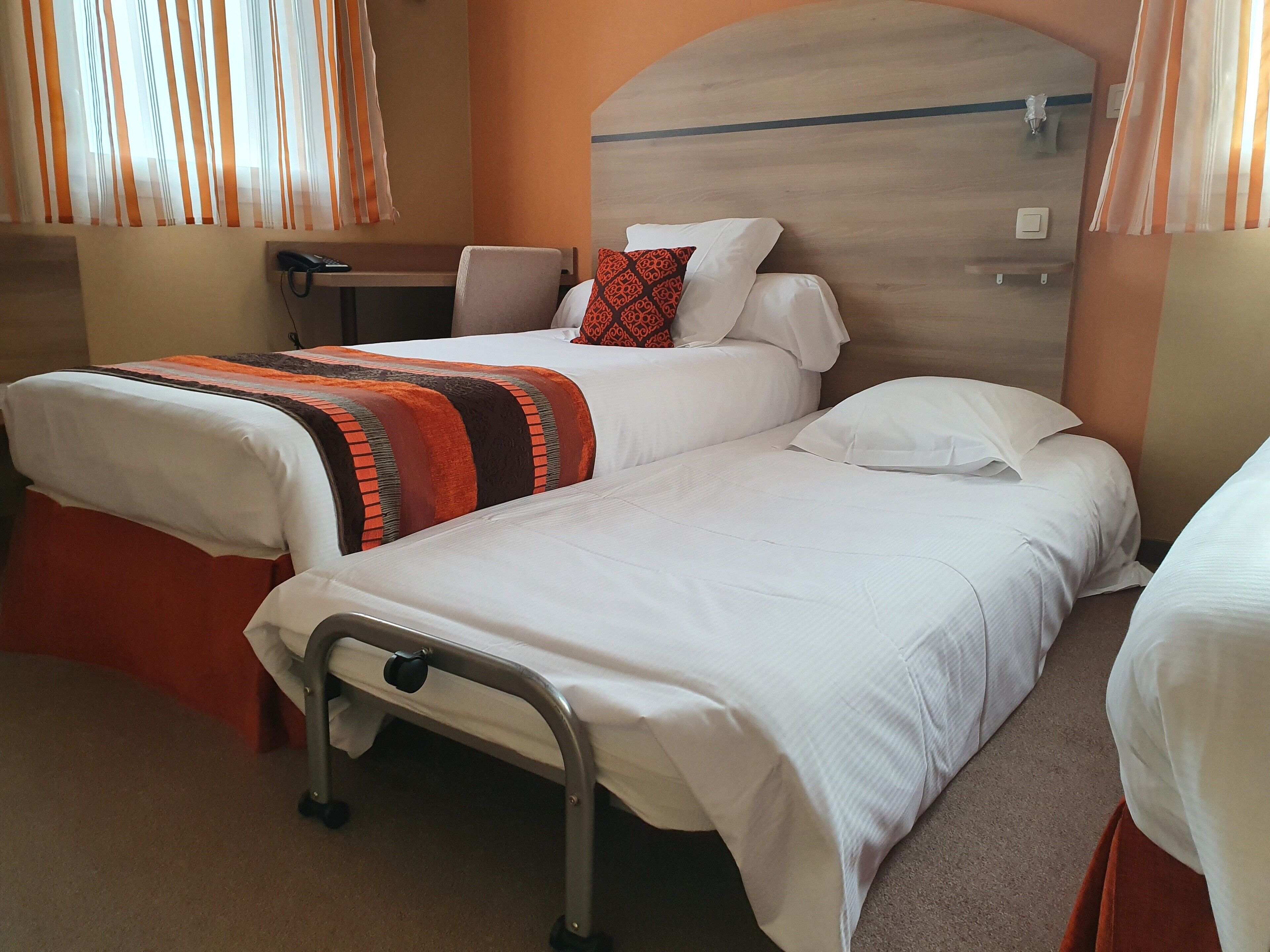 desk, blackout curtains, soundproofing, cots/infant beds