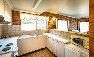 Apartment, 2 Bedrooms | Dapur peribadi | Peti sejuk, ketuhar gelombang mikro, pembancuh kopi/teh, cerek elektrik