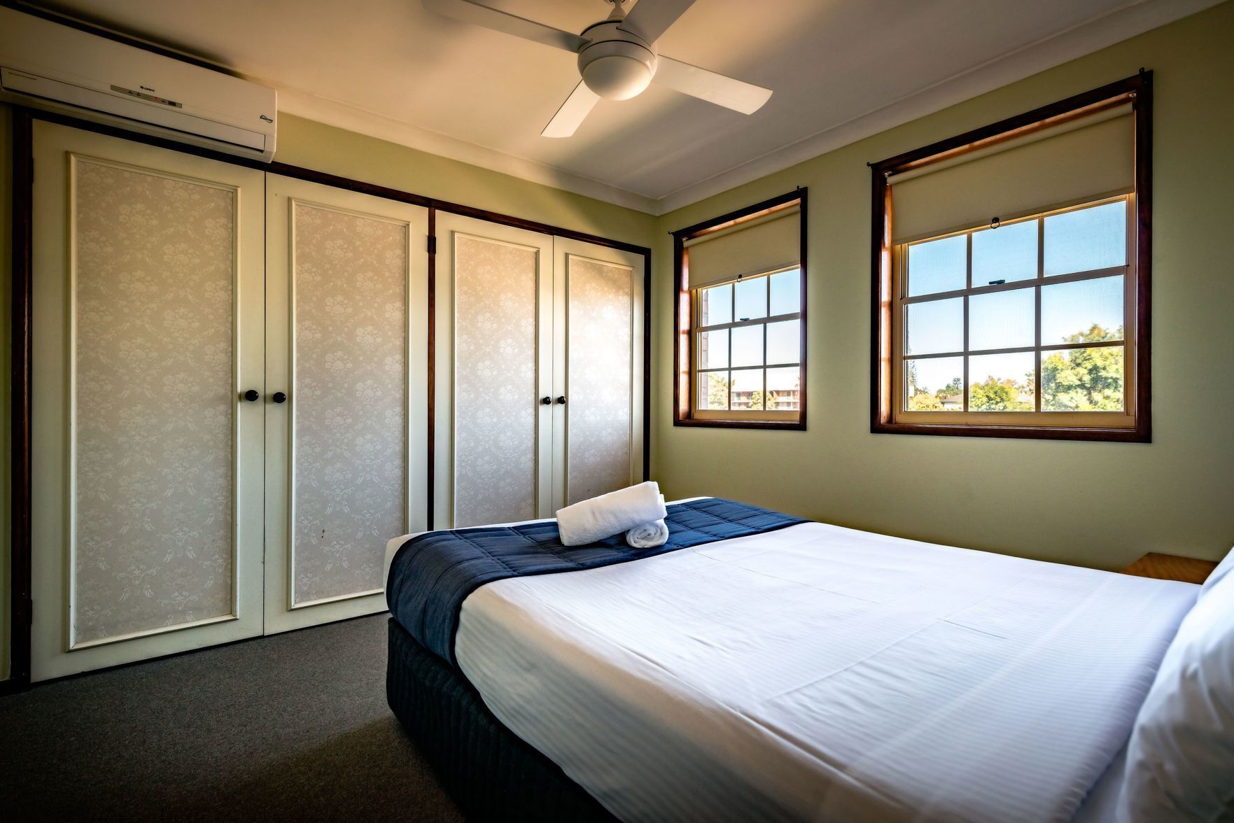 Premium bedding, pillowtop beds, desk, blackout drapes