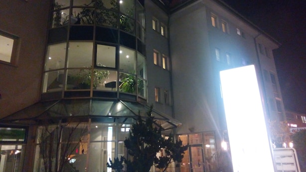 A multi-story building with balconies and large windows. - Central Hotel (Winnenden)