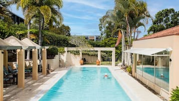 Outdoor pool, pool umbrellas, pool loungers