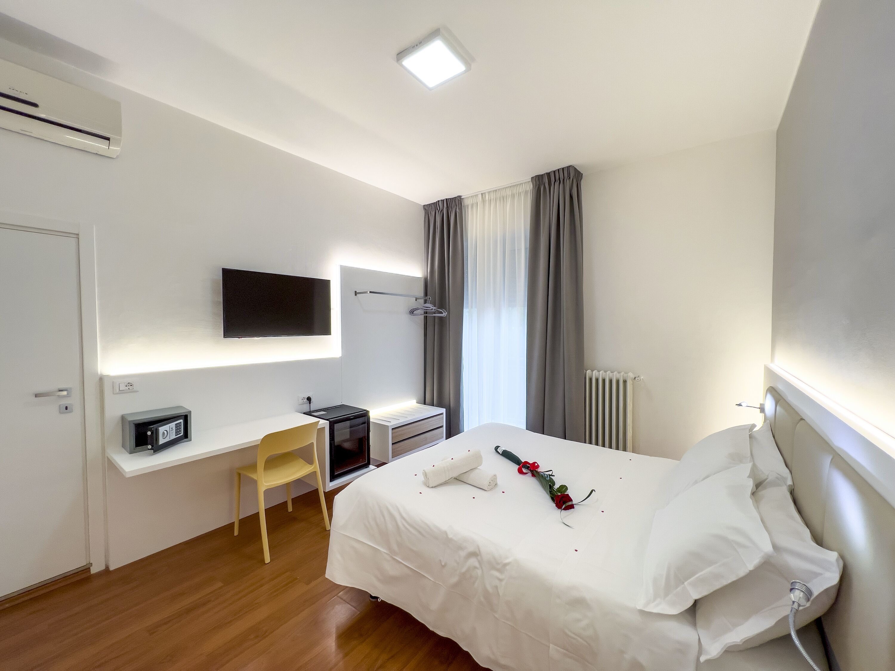 Premium bedding, down comforters, Select Comfort beds, minibar