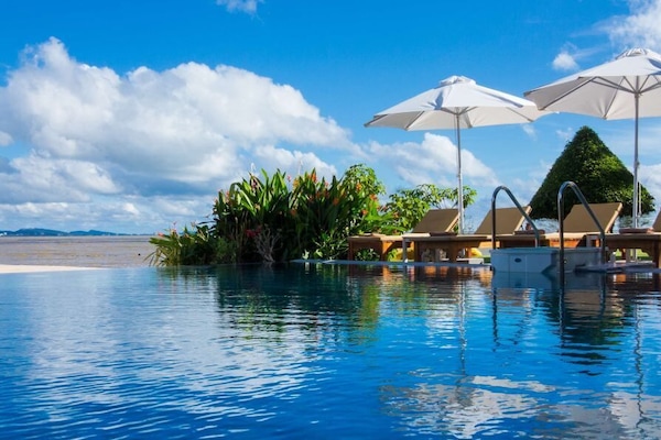 Outdoor pool, pool umbrellas, sun loungers
