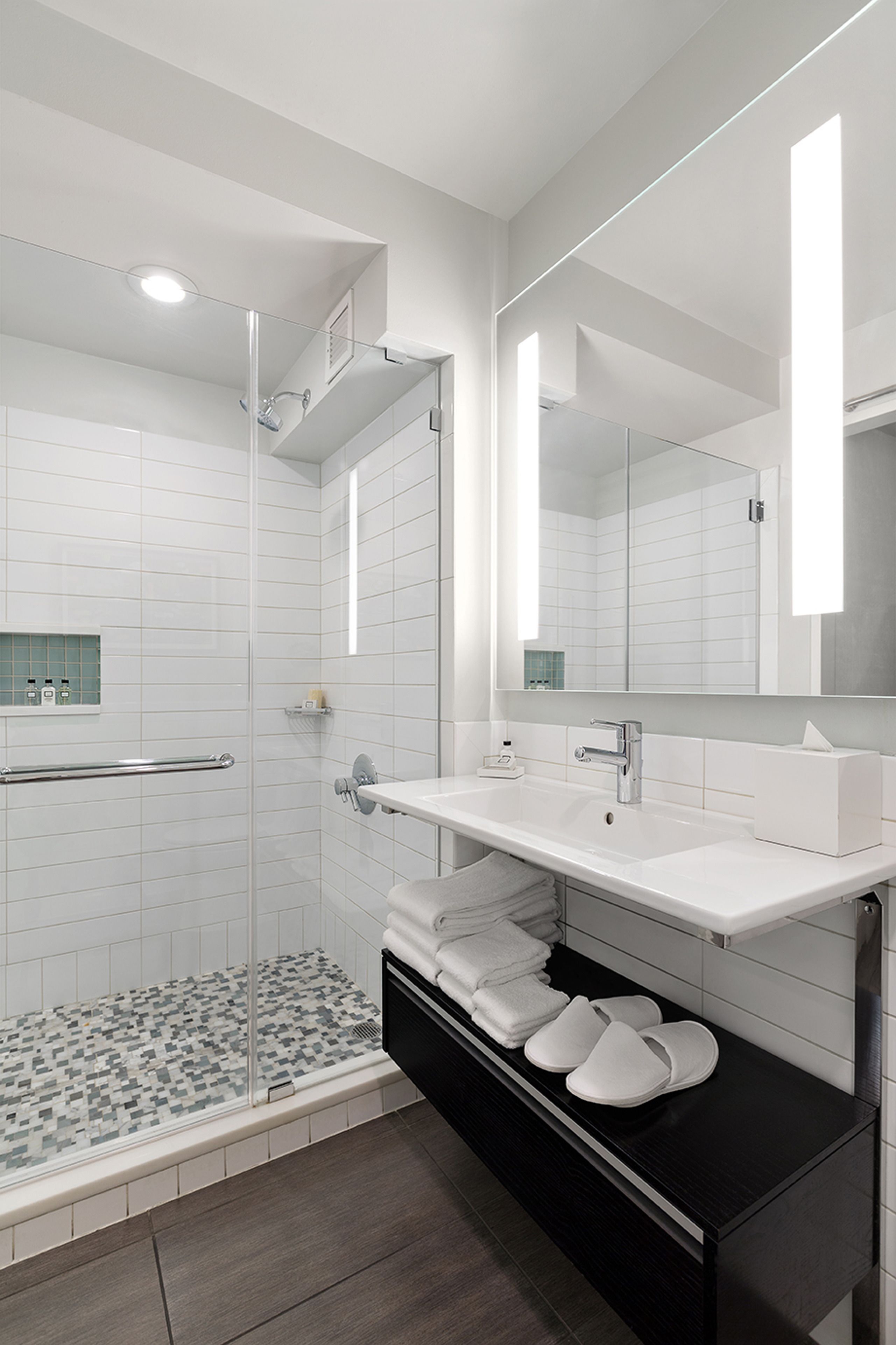 shower, rainfall showerhead, designer toiletries, hair dryer