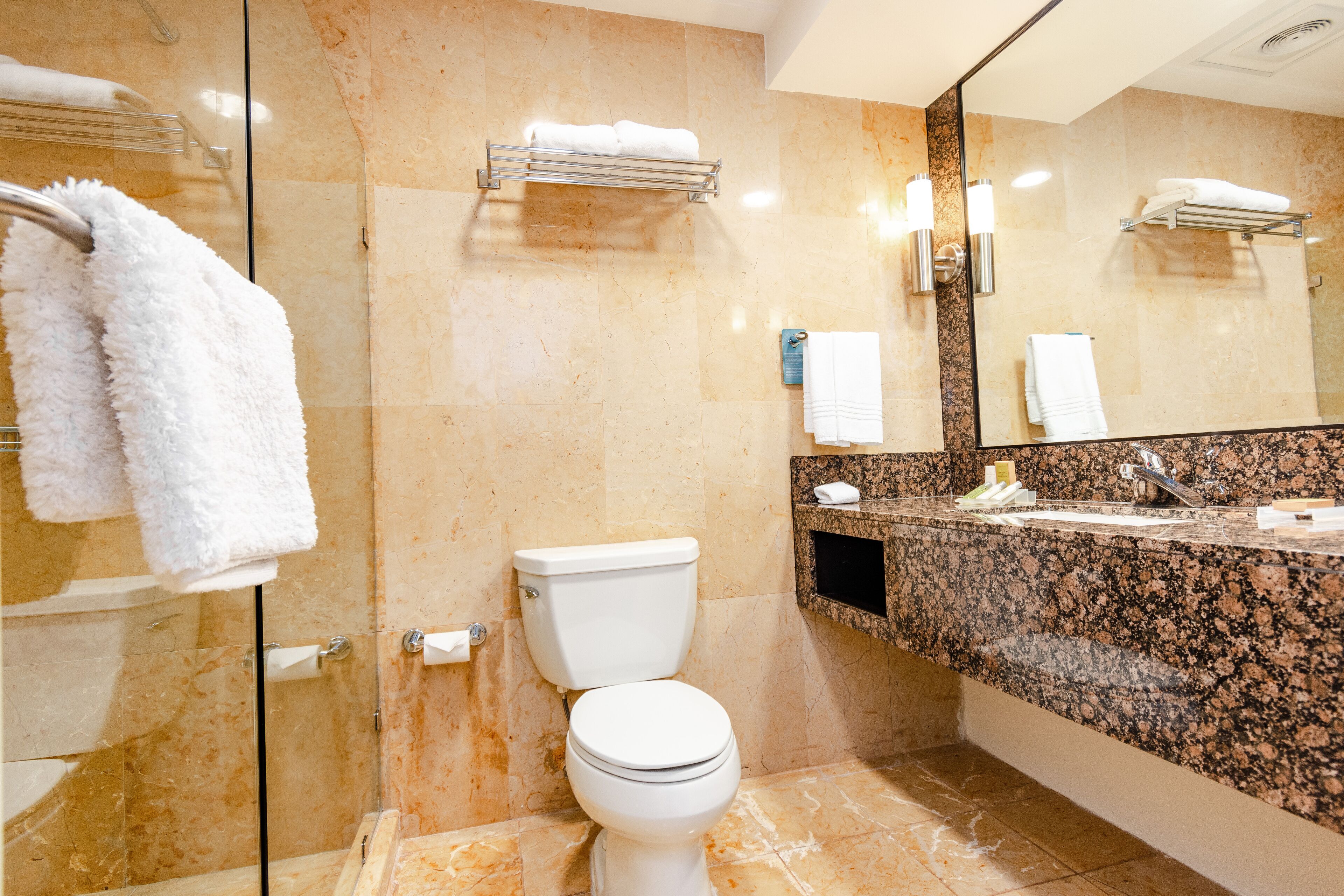 shower, rainfall showerhead, designer toiletries, hair dryer