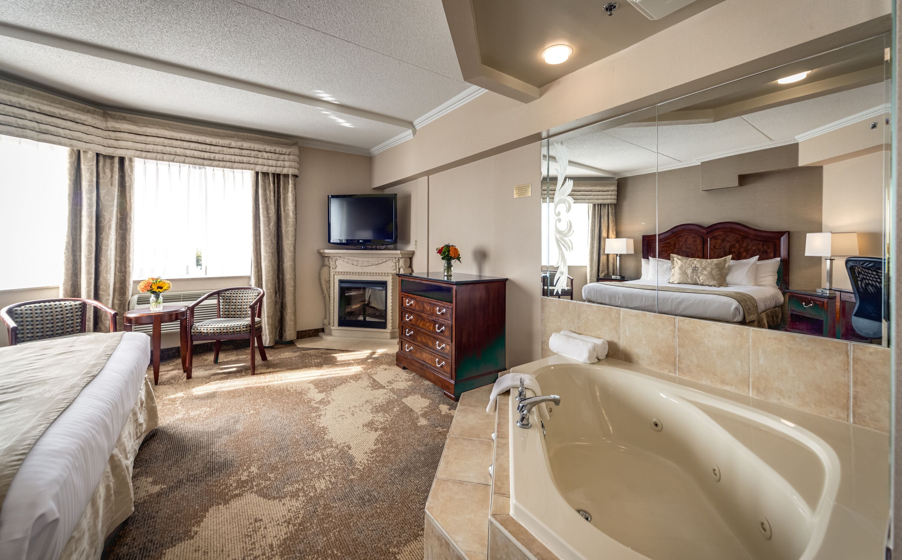 king suite with jetted tub | premium bedding, down duvets, in-room safe, individually decorated