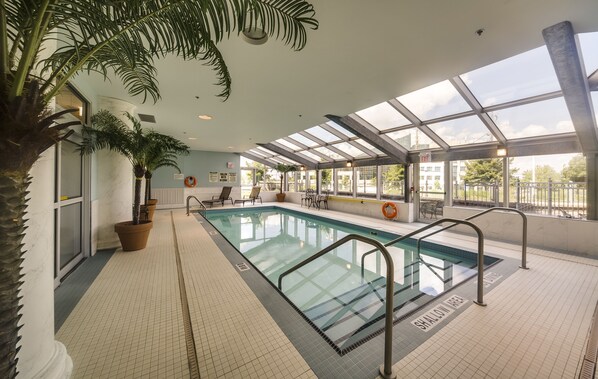 Indoor pool, open 8:00 AM to 10:00 PM, pool loungers