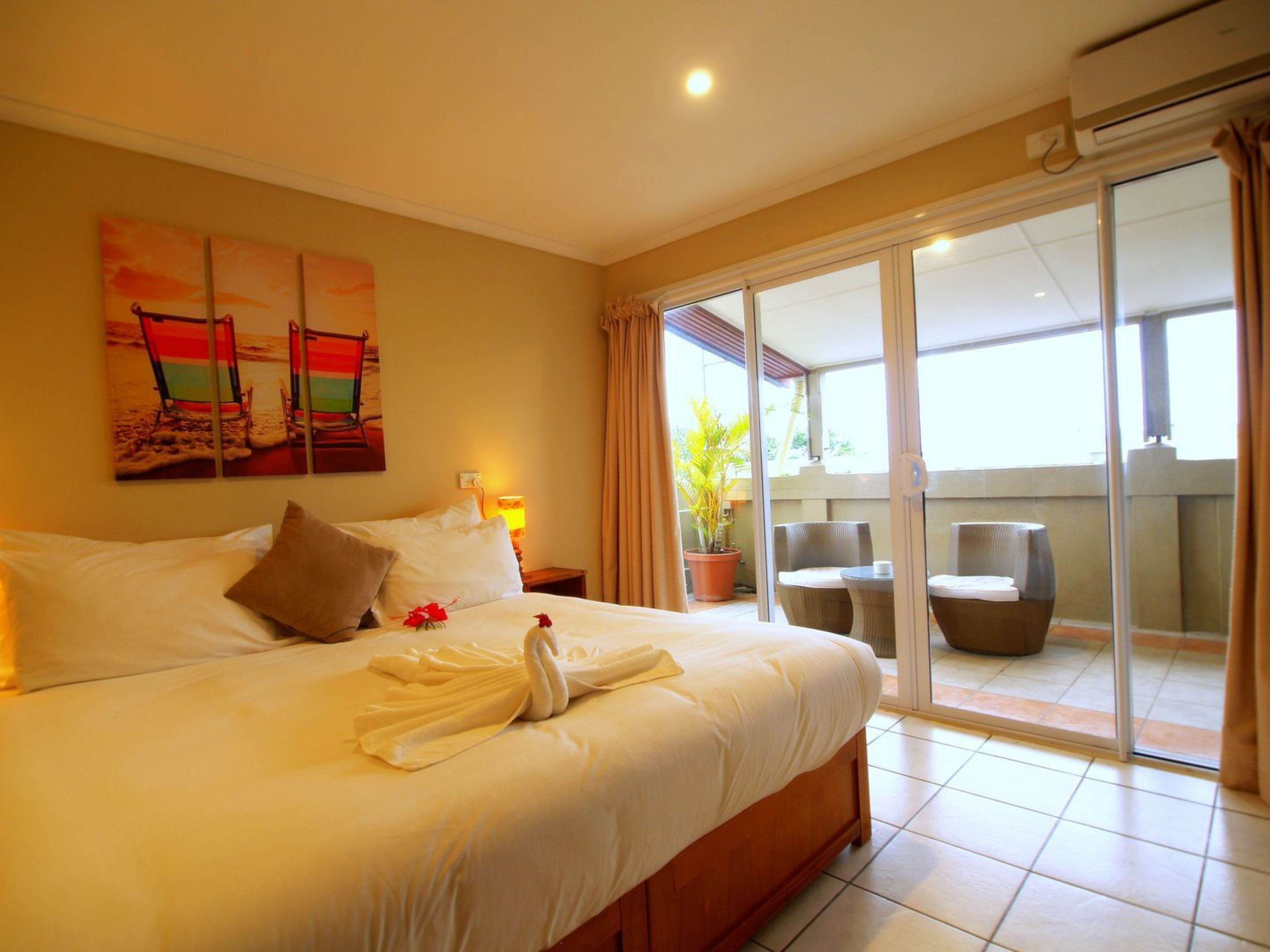 deluxe room, 1 bedroom, balcony | tempur-pedic beds, in-room safe, iron/ironing board