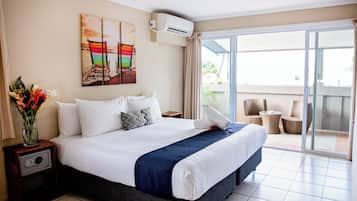 Deluxe Room, 1 Bedroom, Balcony | Tempur-Pedic beds, in-room safe, iron/ironing board