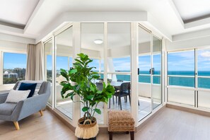 Penthouse, 4 Bedrooms, Ocean View (Level 10) | Living area | 32-inch flat-screen TV with digital channels, TV, DVD player