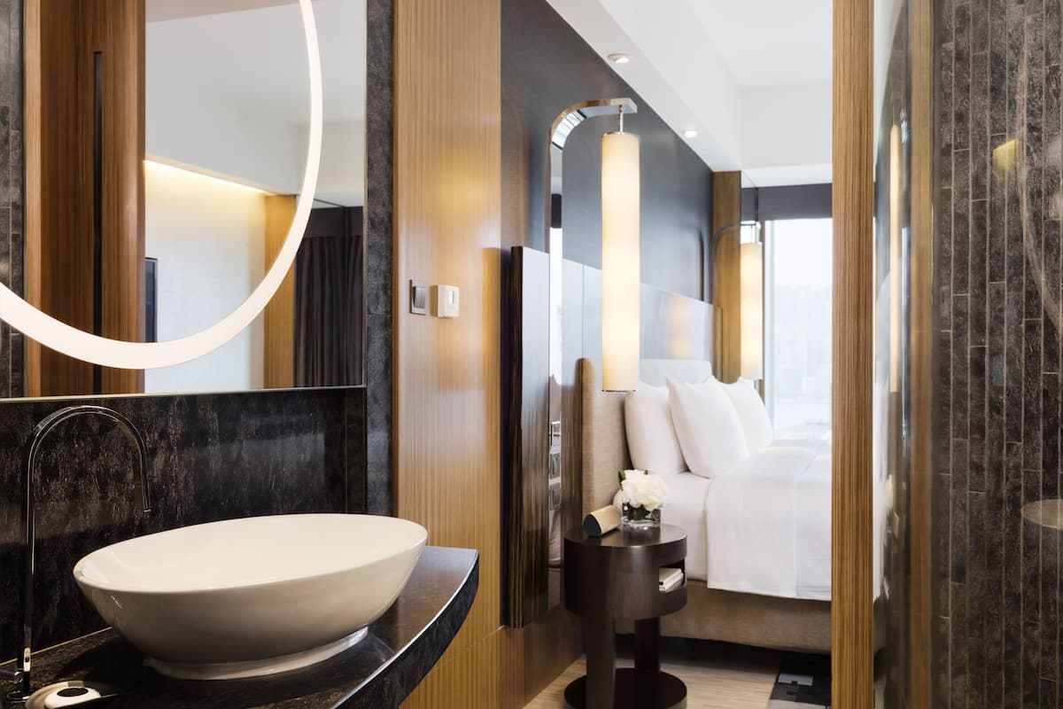 rainfall showerhead, hair dryer, bathrobes, slippers