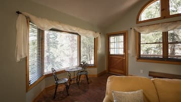 Wood Nymph | Living area | 55-inch Smart TV with digital channels, fireplace, Netflix