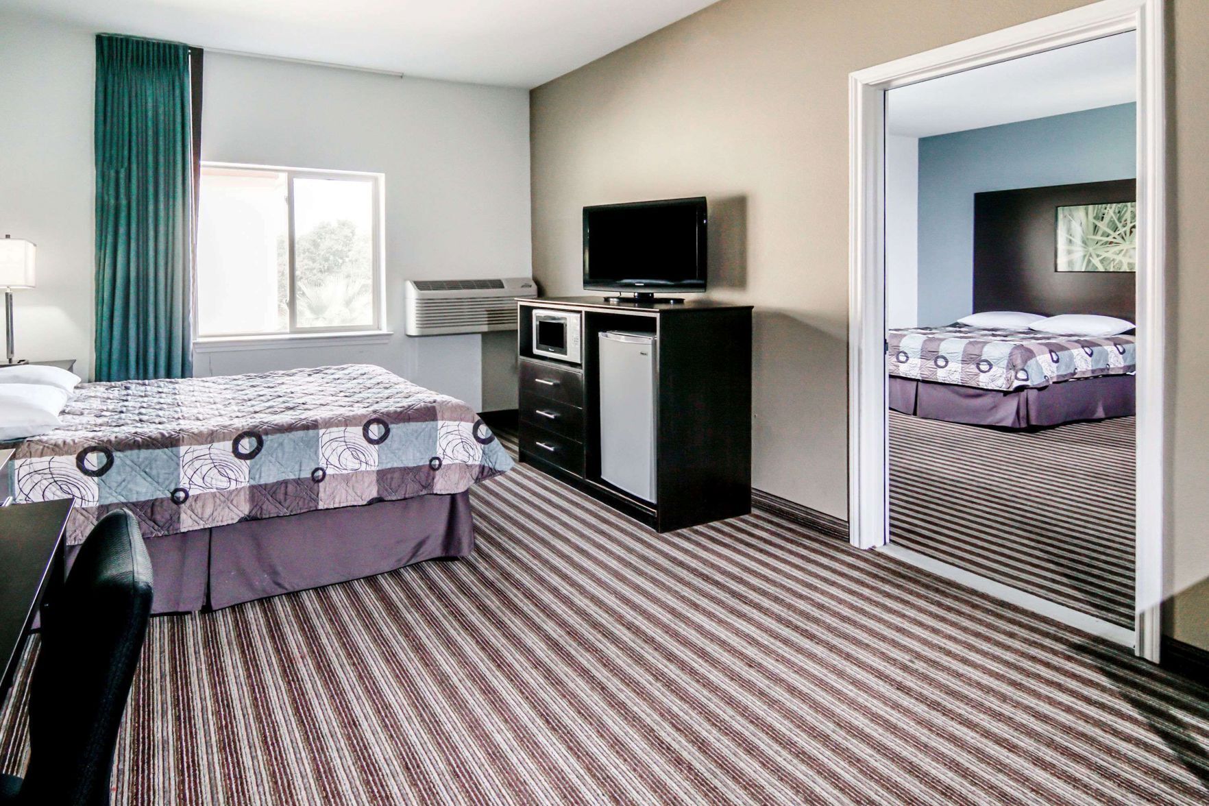 Desk, blackout drapes, soundproofing, iron/ironing board