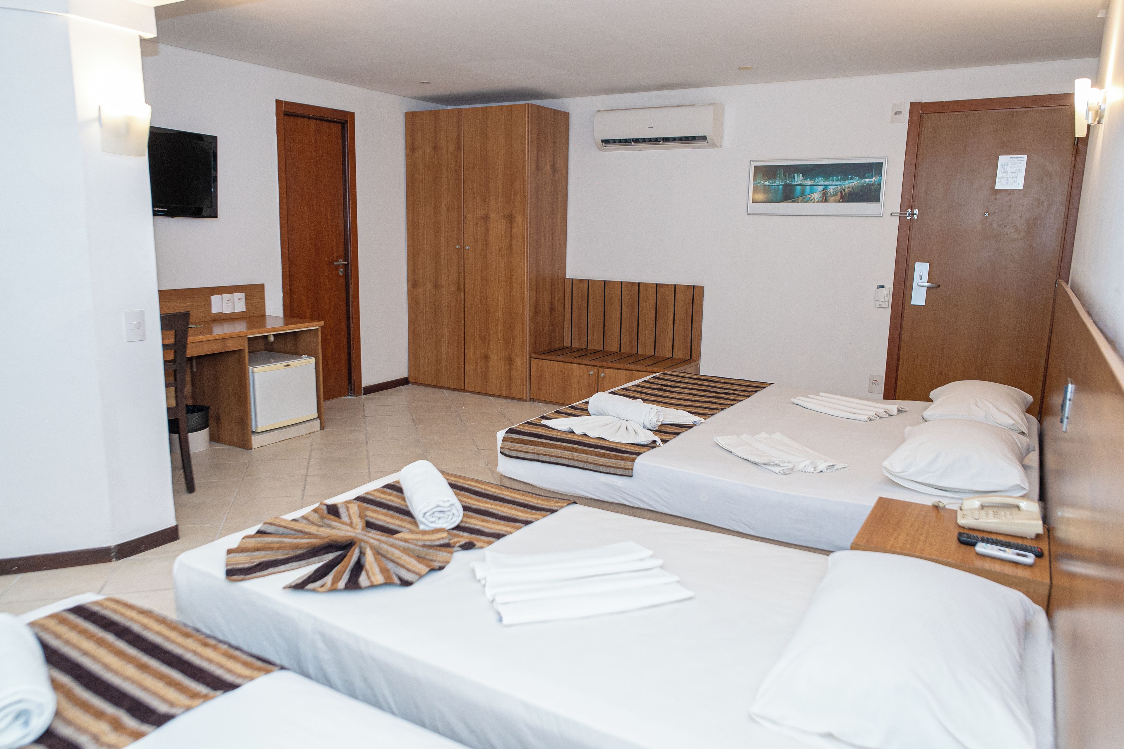 Superior Quadruple Room | Minibar, in-room safe, blackout drapes, soundproofing