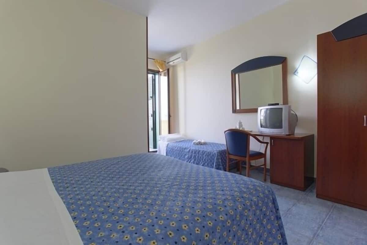 Triple Room | Minibar, desk, blackout drapes, cribs (surcharge)