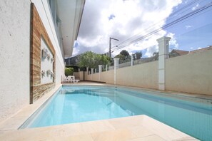 Outdoor pool, pool umbrellas, pool loungers
