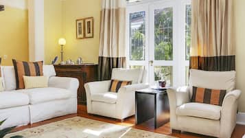 21-inch flat-screen TV with satellite channels, TV